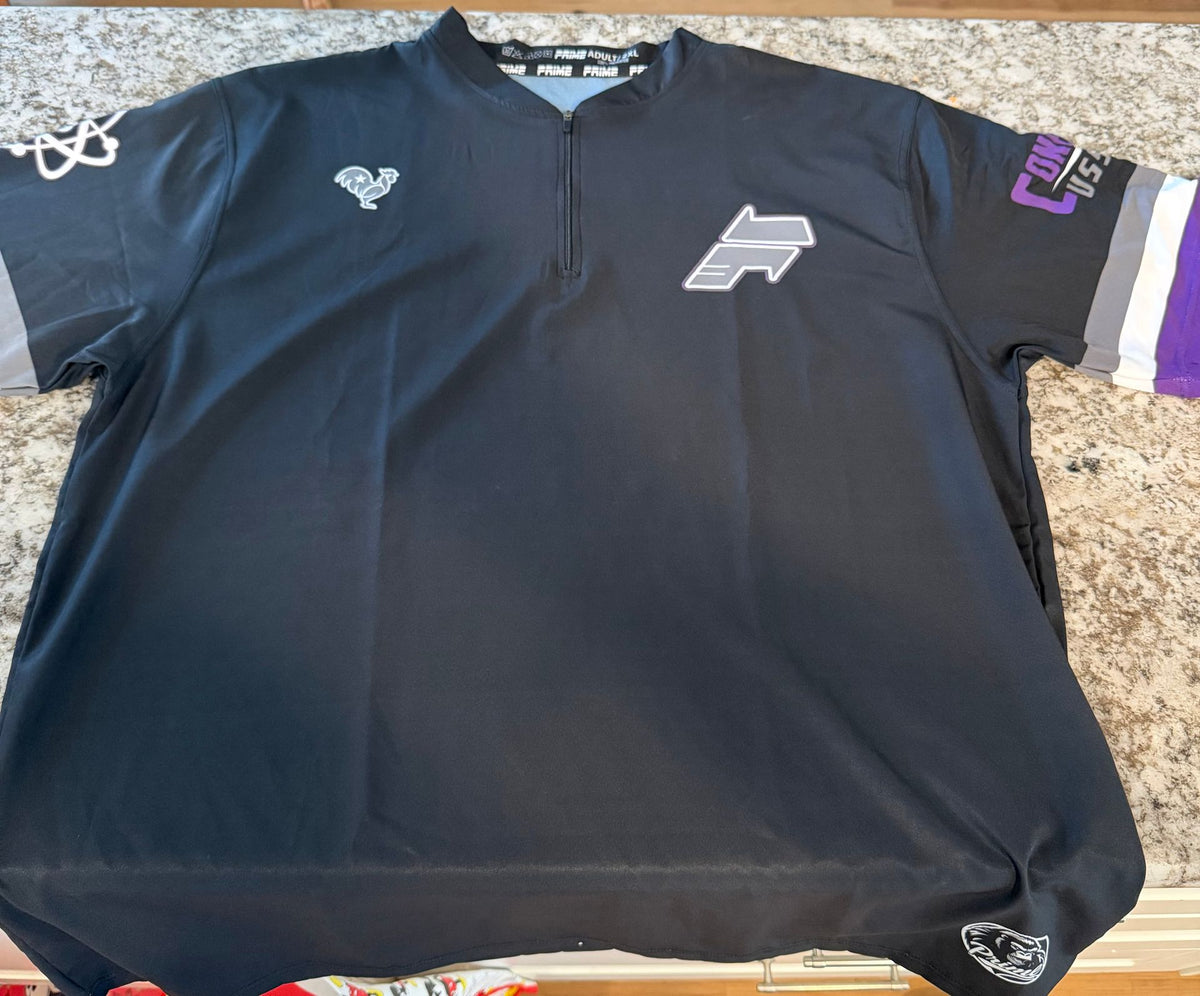 Black quarter-zip pullover with custom team logos and purple accent sleeve, Prime Apparel