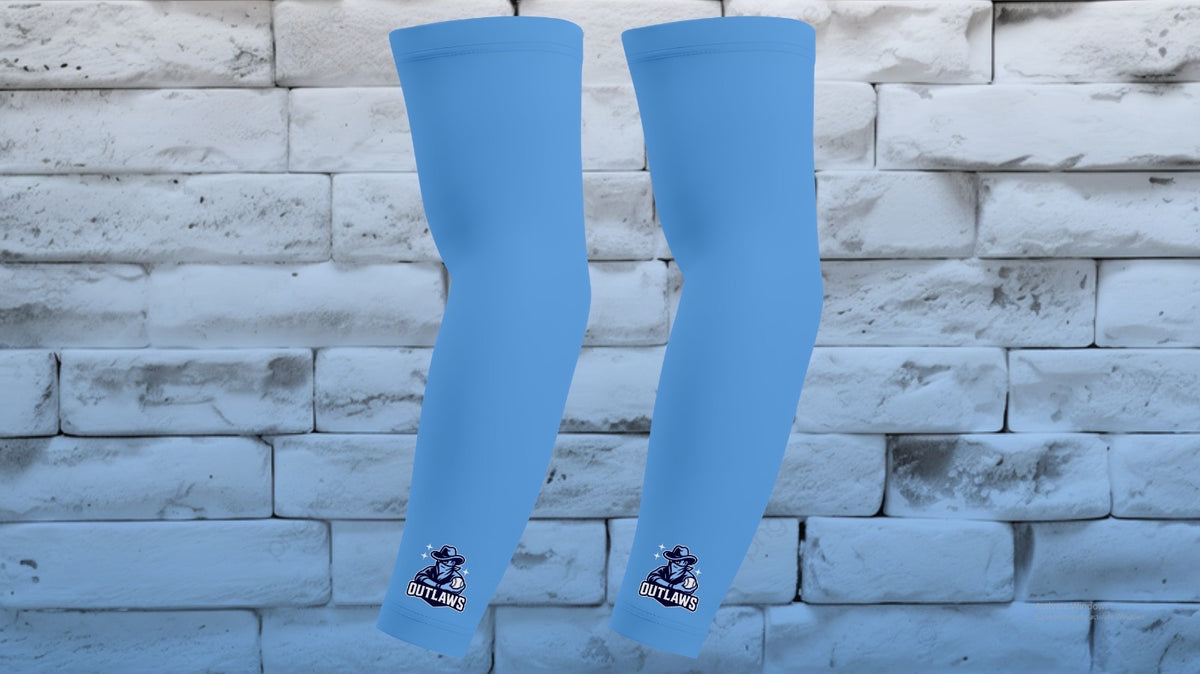 Pair of light blue Outlaws compression arm sleeves with mascot logo