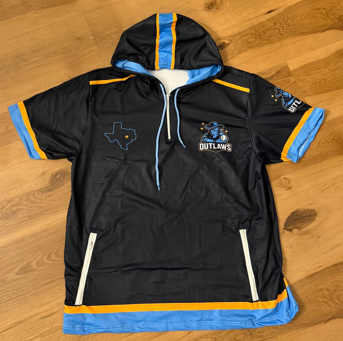 Black Outlaws quarter-zip hooded top with gold and blue Texas mascot graphic