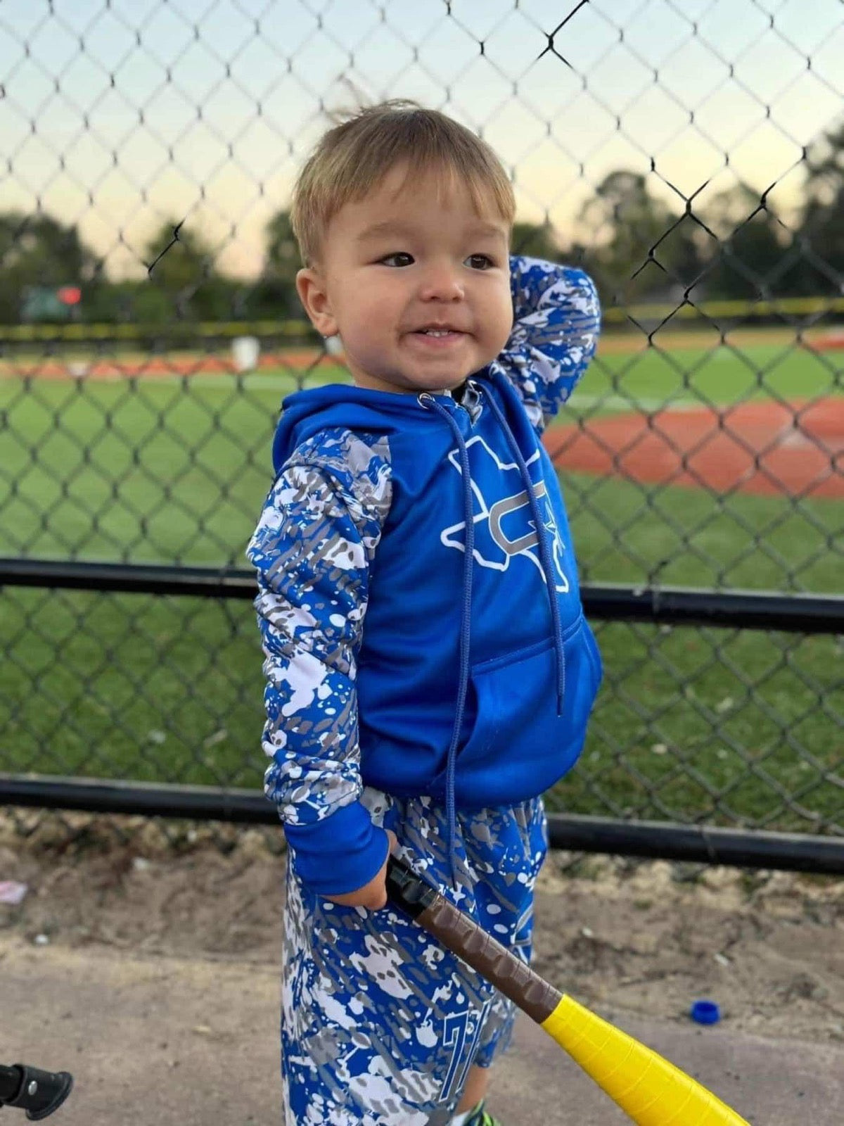 Young athlete in custom blue hoodie